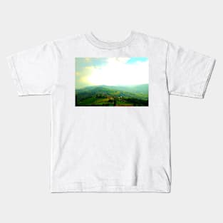 View from Monte San Martino at light, sun, clouds, Sibillini, hills, trees and roads Kids T-Shirt